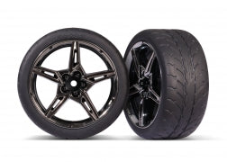 TRA9371    Tires & wheels, assembled, glued (split-spoke black chrome wheels, 2.1" Response tires) (extra wide, rear) (2)