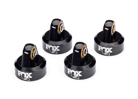 TRA8456  Shock caps, aluminum (black-anodized), Fox® shocks (4)